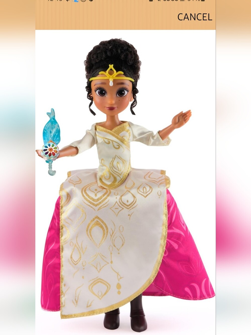 The Spellbound Singing Ellian 9.5-Inch Doll is a dark brown curly-haired girl